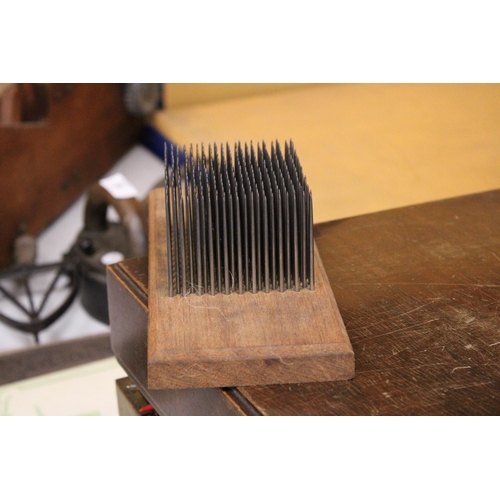 44 - A SPINNERS FLAX HETCHEL FOR COMBING FLAX FIBRES IN PREPARATION FOR SPINNING