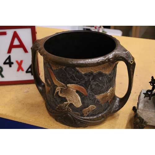 51 - A LARGE BRETBY BAMBOO WARE ART POTTERY JARDINIERE WITH HERON DECORATION AND TWO HANDLES WITH PIERCIN... 