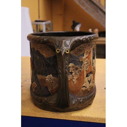 51 - A LARGE BRETBY BAMBOO WARE ART POTTERY JARDINIERE WITH HERON DECORATION AND TWO HANDLES WITH PIERCIN... 