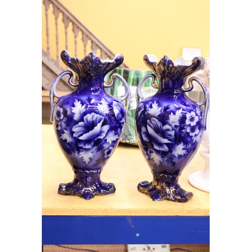 53 - A PAIR OF VICTORIAN BLUE AND WHITE HANDPAINTED TWIN HANDLED VASES, MARKED ROUEN TO THE BASE, HEIGHT ... 