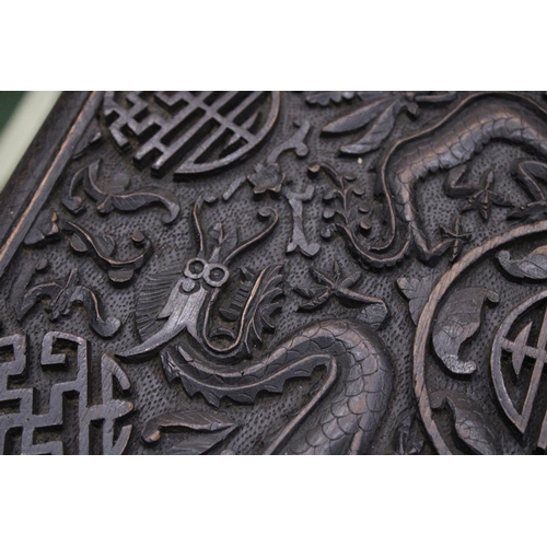 59 - A SMALL ORIENTAL HARDWOOD TABLE WITH CARVED ORIENTAL DECORATION, HEIGHT 44CM