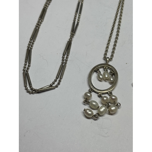 685 - FOUR MARKED SILVER NECKLACES TO INCLUDE THREE WITH PENDANTS AND A DOUBLE STRAND