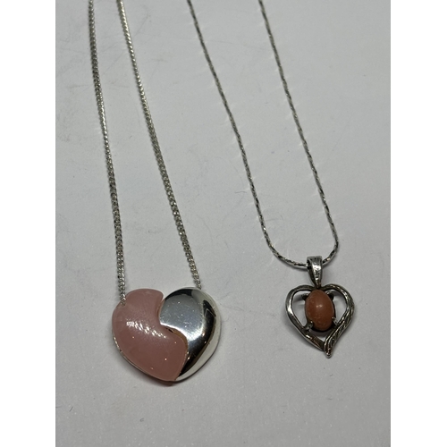 686 - FOUR MARKED SILVER NECKLACES WITH PENDANTS