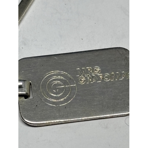 687 - A MARKED SILVER KEY RING