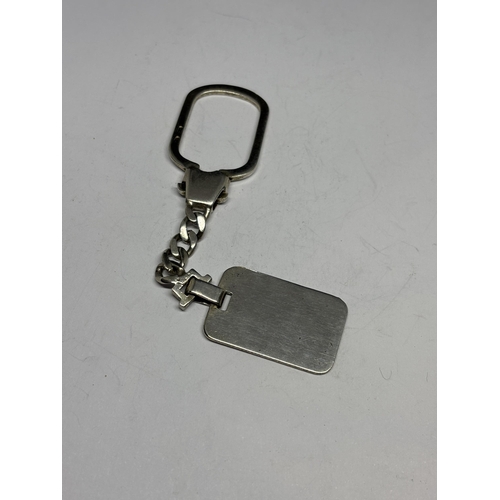 687 - A MARKED SILVER KEY RING