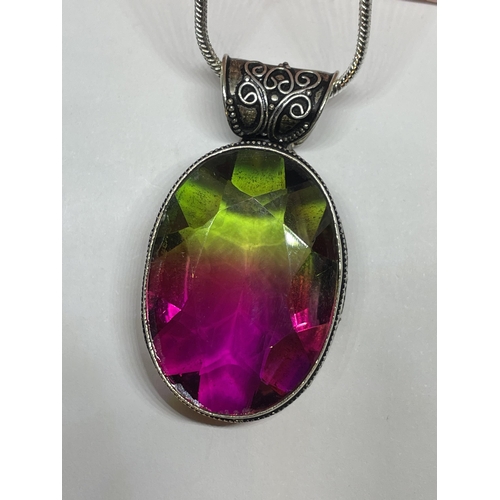 717 - A MARKED 925 SILVER NECKLACE WITH LARGE MULTI TOURMALINE PENDANT IN A PRESENTATION BOX