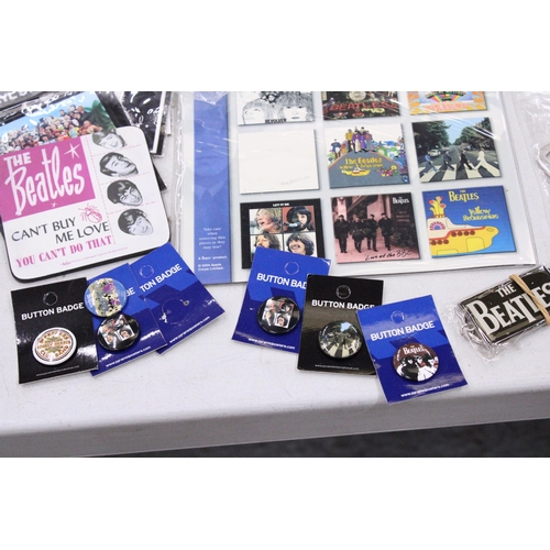 195 - A COLLECTION OF BEATLES ITEMS TO INCLUDE TINS, A TAXI CAR, STICKERS, MAGNETS, BADGES, ETC