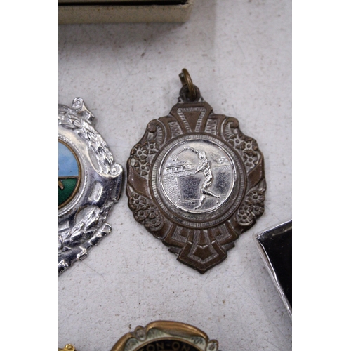 198 - FIVE FOOTBALL THEMED MEDALLIONS/FOBS