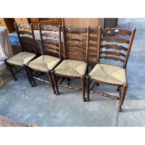 2706 - A SET OF FOUR LANCASHIRE STYLE LADDER BACK DINING CHAIRS WITH RUSH SEATS