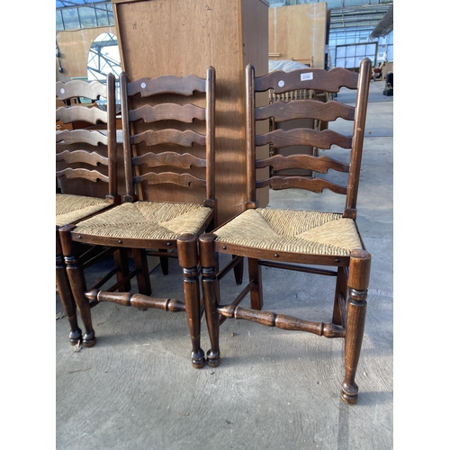 2706 - A SET OF FOUR LANCASHIRE STYLE LADDER BACK DINING CHAIRS WITH RUSH SEATS