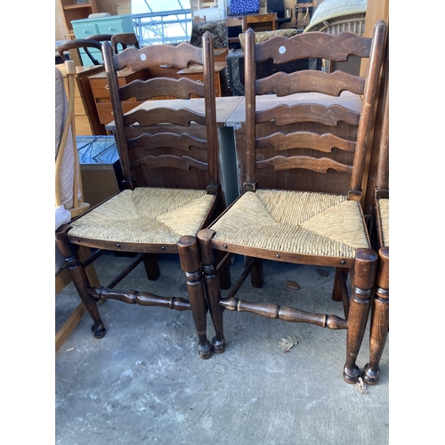 2706 - A SET OF FOUR LANCASHIRE STYLE LADDER BACK DINING CHAIRS WITH RUSH SEATS