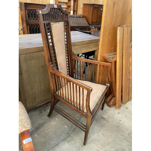 2722 - A HIGH BACK UPHOLSTERED ARMCHAIR IN THE RENNIE MACKINTOCH STYLE WITH TALL BACK AND MULTIPLE SPINDLES