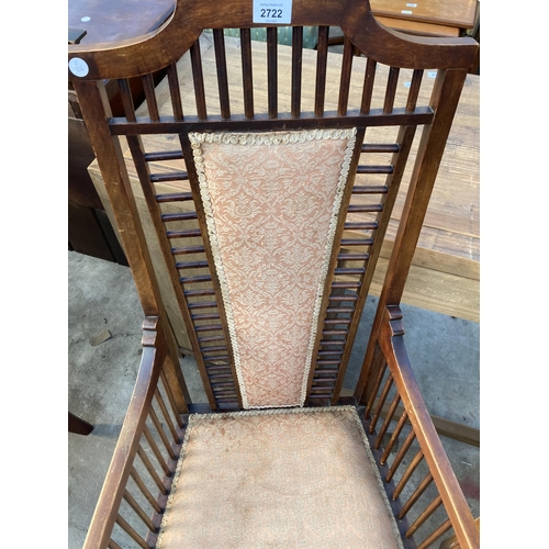 2722 - A HIGH BACK UPHOLSTERED ARMCHAIR IN THE RENNIE MACKINTOCH STYLE WITH TALL BACK AND MULTIPLE SPINDLES