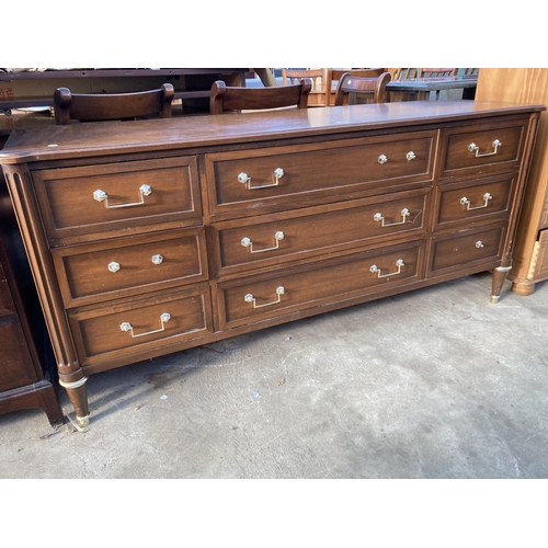 2726 - A HARDWOOD SIDEBOARD ENCLOSING SIX SHORT AND THREE LONG DRAWERS, 63