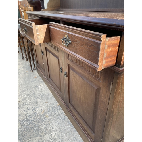 2744 - AN OAK DRESSER WITH GLAZED AND LEADED UPPER PORTION, 55