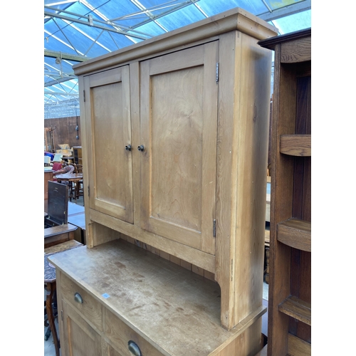 2750 - A VICTORIAN STYLE PINE KITCHEN DRESSER WITH FOUR CUPBOARDS AND TWO DRAWERS WITH SCOOP HANDLES, 47.5