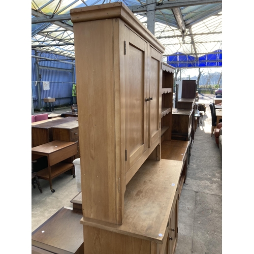 2750 - A VICTORIAN STYLE PINE KITCHEN DRESSER WITH FOUR CUPBOARDS AND TWO DRAWERS WITH SCOOP HANDLES, 47.5