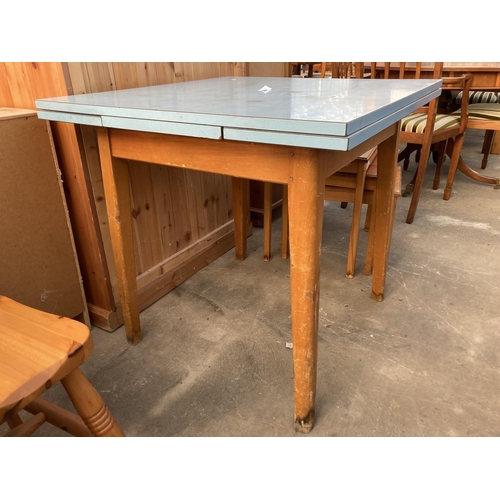 2801 - A 1950'S FORMICA TOP DRAW LEAF KITCHEN TABLE