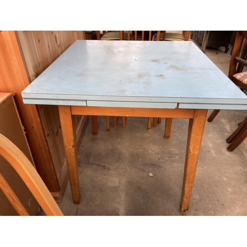 2801 - A 1950'S FORMICA TOP DRAW LEAF KITCHEN TABLE