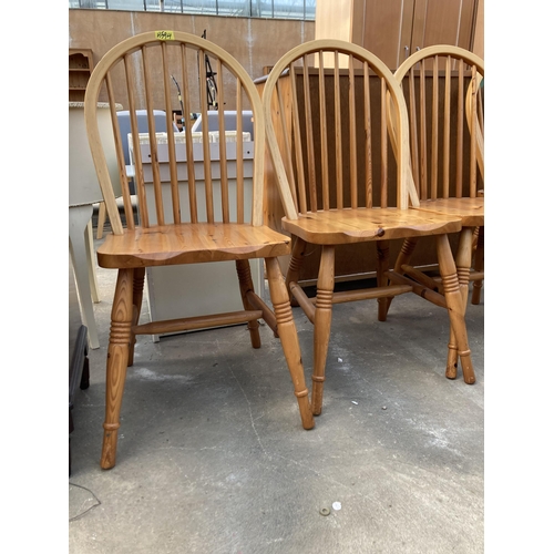 2802 - A SET OF FOUR PINE WINDSOR STYLE KITCHEN CHAIRS