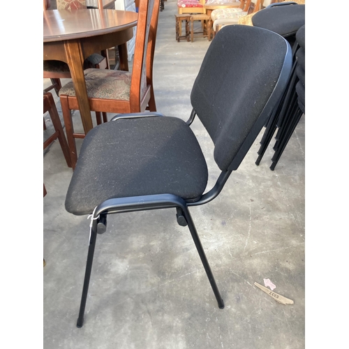 2840 - SIXTEEN BLACK METAL FRAMED STACKING CHAIRS