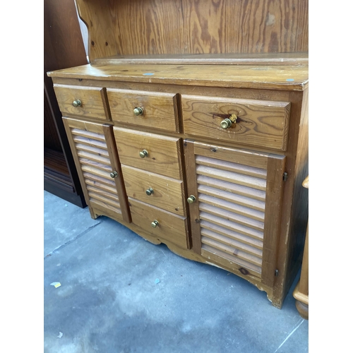 2864 - A PINE DRESSER WITH PLATE RACK, 44