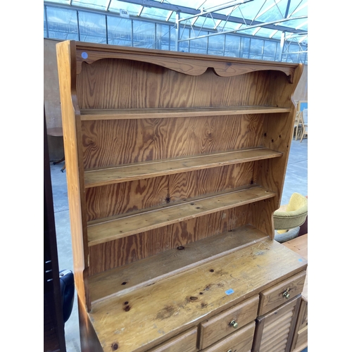 2864 - A PINE DRESSER WITH PLATE RACK, 44