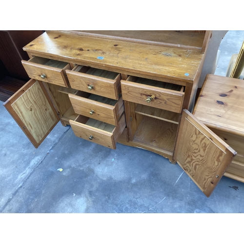 2864 - A PINE DRESSER WITH PLATE RACK, 44