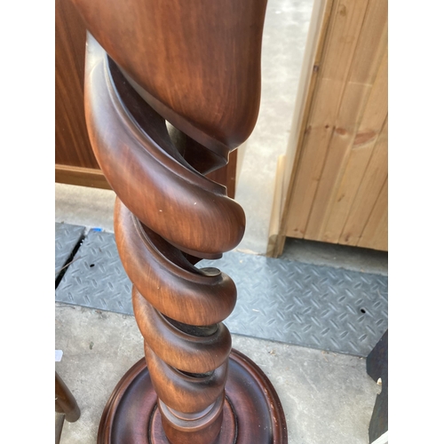 2868 - A VICTORIAN STYLE JARDINIER STAND ON OPEN BARLEY TWIST COLUMN