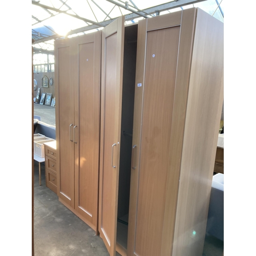 2877 - A PAIR OF TWO DOOR WARDROBES, 36