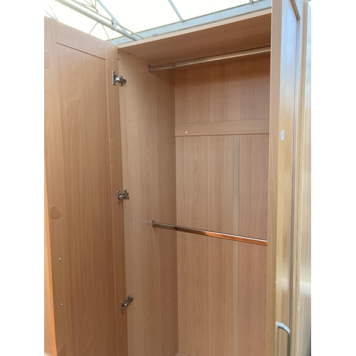 2877 - A PAIR OF TWO DOOR WARDROBES, 36