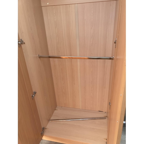 2877 - A PAIR OF TWO DOOR WARDROBES, 36