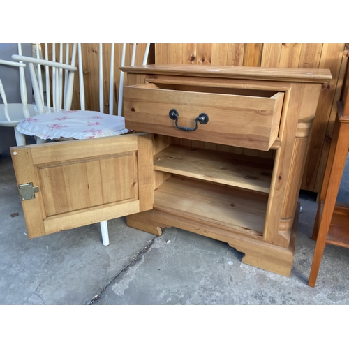 2902 - A PINE SIDE CABINET WITH SINGLE DOOR AND DRAWER, 17.5