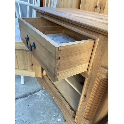 2902 - A PINE SIDE CABINET WITH SINGLE DOOR AND DRAWER, 17.5