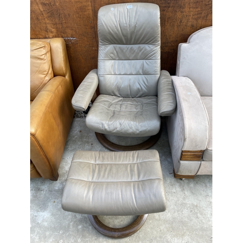 2518 - A STRESSLESS EKORNES REVOLVING RECLINER CHAIR AND MATCHING STOOL