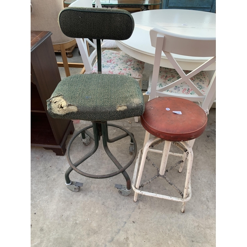 2538 - AN INDUSTRIAL STYLE SPRUNG STOOL AND REVOLVING CHAIR ON TUBULAR FRAME