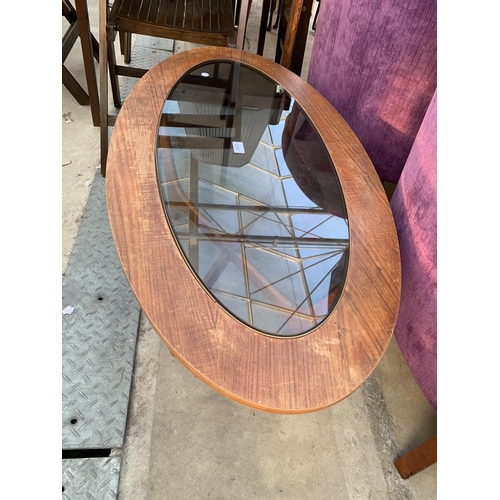 2596 - AN OVAL RETRO TEAK COFFEE TABLE WITH SMOKED GLASS INSET TOP, 42