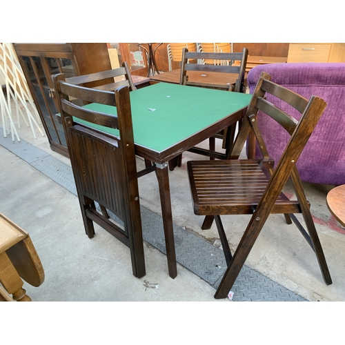 2597 - A FOLDING CARD TABLE AND FOUR FOLDING CHAIRS