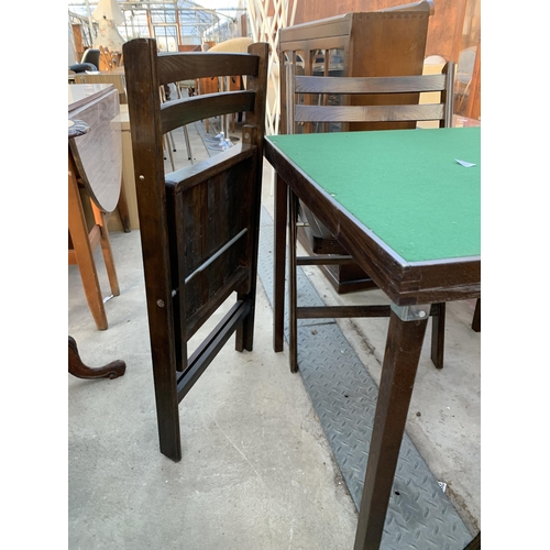 2597 - A FOLDING CARD TABLE AND FOUR FOLDING CHAIRS