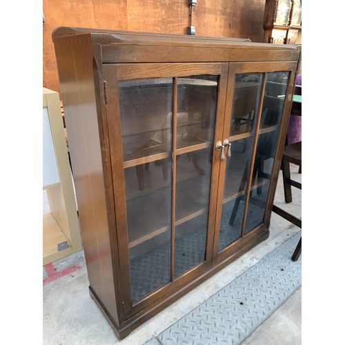 2598 - A MID 20TH CENTURY OAK TWO DOOR GLAZED BOOKCASE, 36