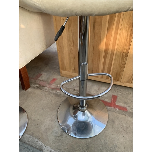 2601 - A PAIR OF PUMP STOOLS ON POLISHED CHROME BASES