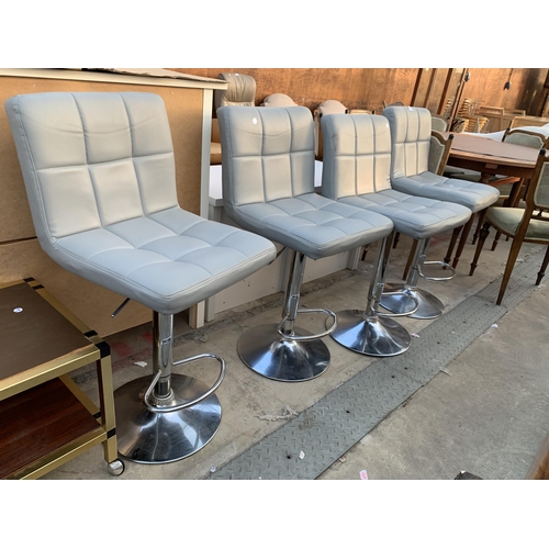 2603 - FOUR PUMP STOOLS ON POLISHED CHROME BASE