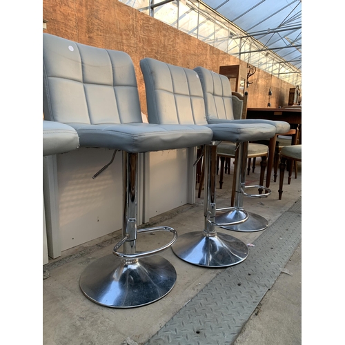 2603 - FOUR PUMP STOOLS ON POLISHED CHROME BASE