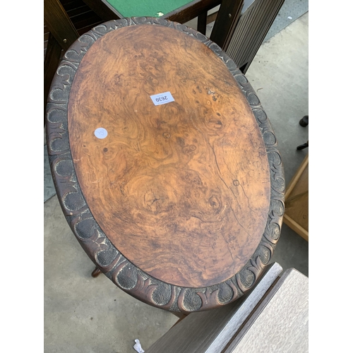 2630 - A VICTORIAN WALNUT WINE TABLE WITH OVAL TOP ON TRIPOD BASE, 22