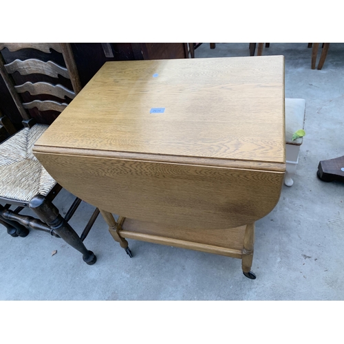 2631 - A MID 20TH CENTURY OAK TWO TIER DROP LEAF TROLLEY