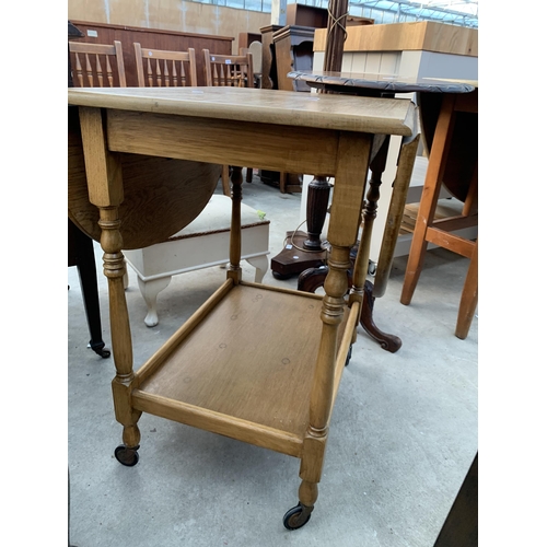 2631 - A MID 20TH CENTURY OAK TWO TIER DROP LEAF TROLLEY