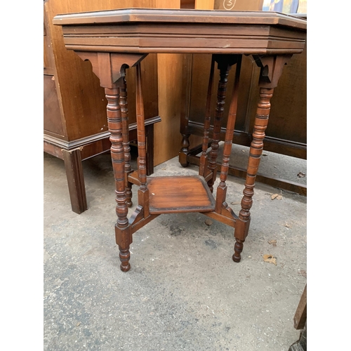 2657 - A LATE VICTORIAN OCTAGONAL TWO TIER CENTRE TABLE ON TURNED LEGS AND UPRIGHTS, 25