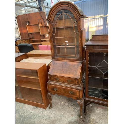 2663 - A QUEEN ANNE STYLE WALNUT AND CROSSBANDED BUREAU BOOKCASE WITH FITTED INTERIOR AND TWO DRAWERS ON CA... 