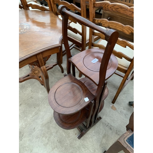 2674 - AN EDWARDIAN MAHOGANY AND INLAID FOLDING FIVE TIER AFTERNOON TEA STAND