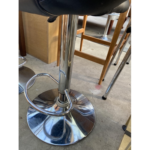 2690 - A PAIR OF PUMP STOOLS ON POLISHED CHROME BASES